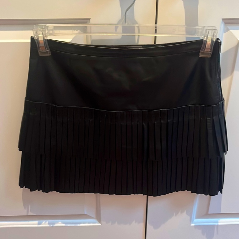 Very cute in excellent condition leather BCBG, mini skirt, very flattering